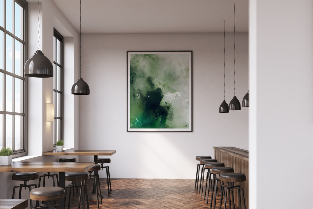 Coffee shop with lovely green and white art framed art print on the wall