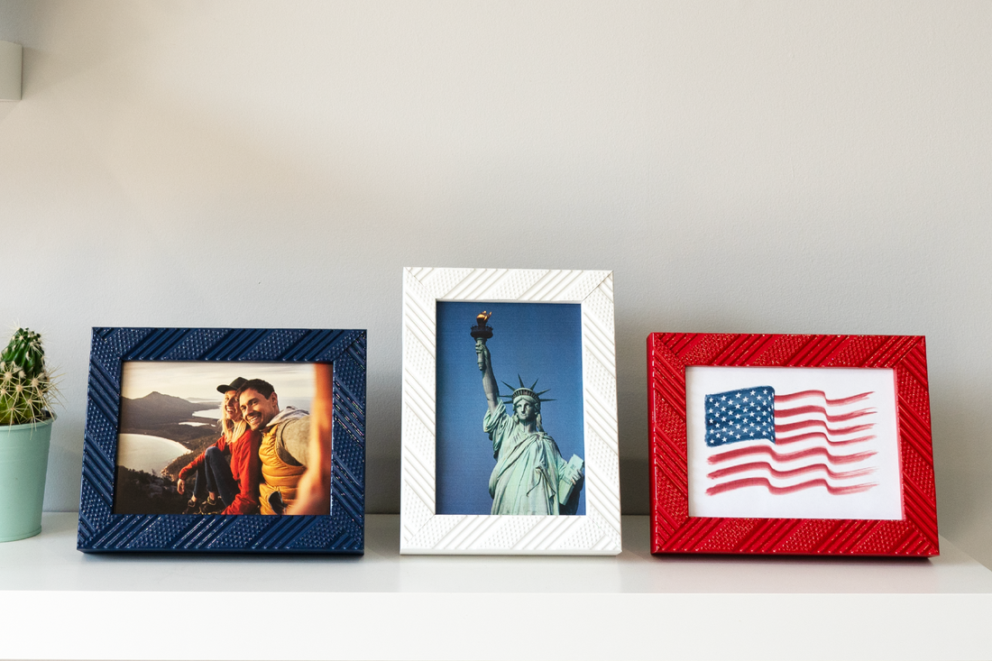 Red white and blue stars and stripes frames with photos inside