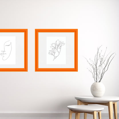 [LIFESTYLE],Orange Marmalade Wide Width Wall Frame in a room