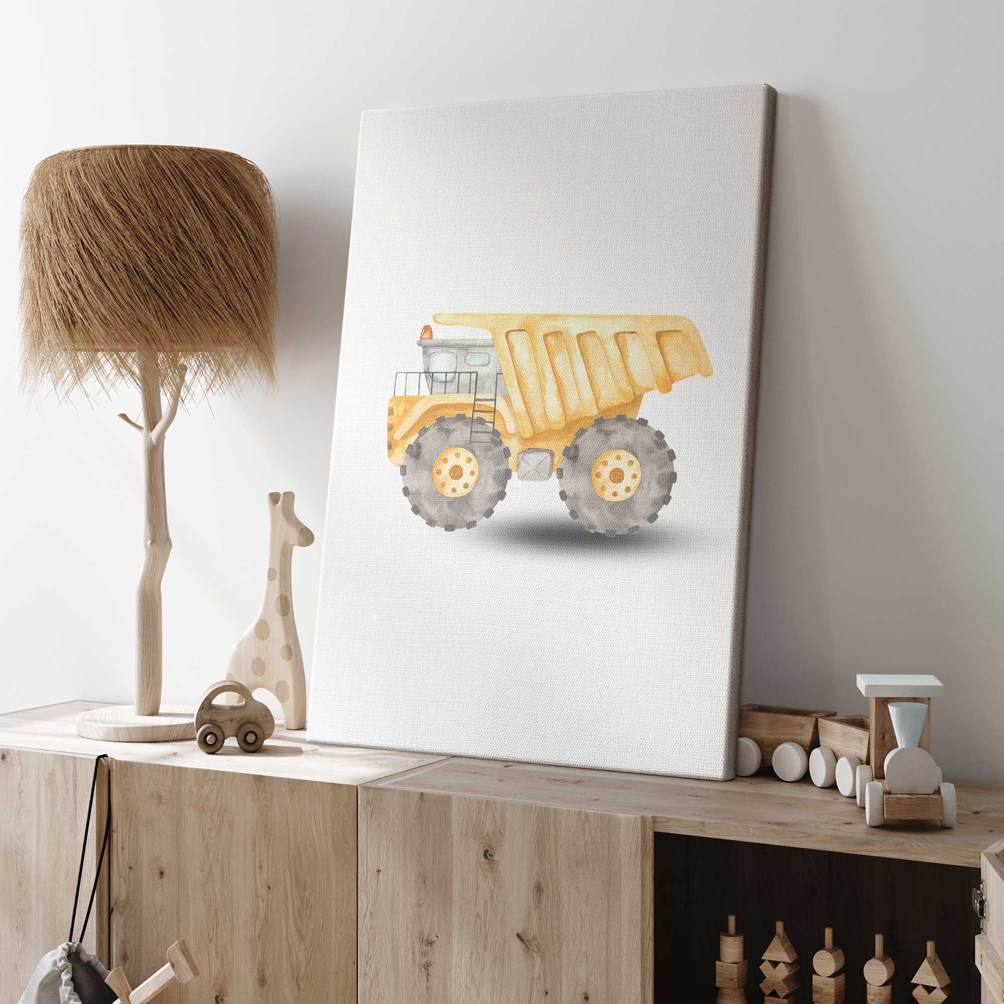 yellow front loader print on canvas in a toddler's room