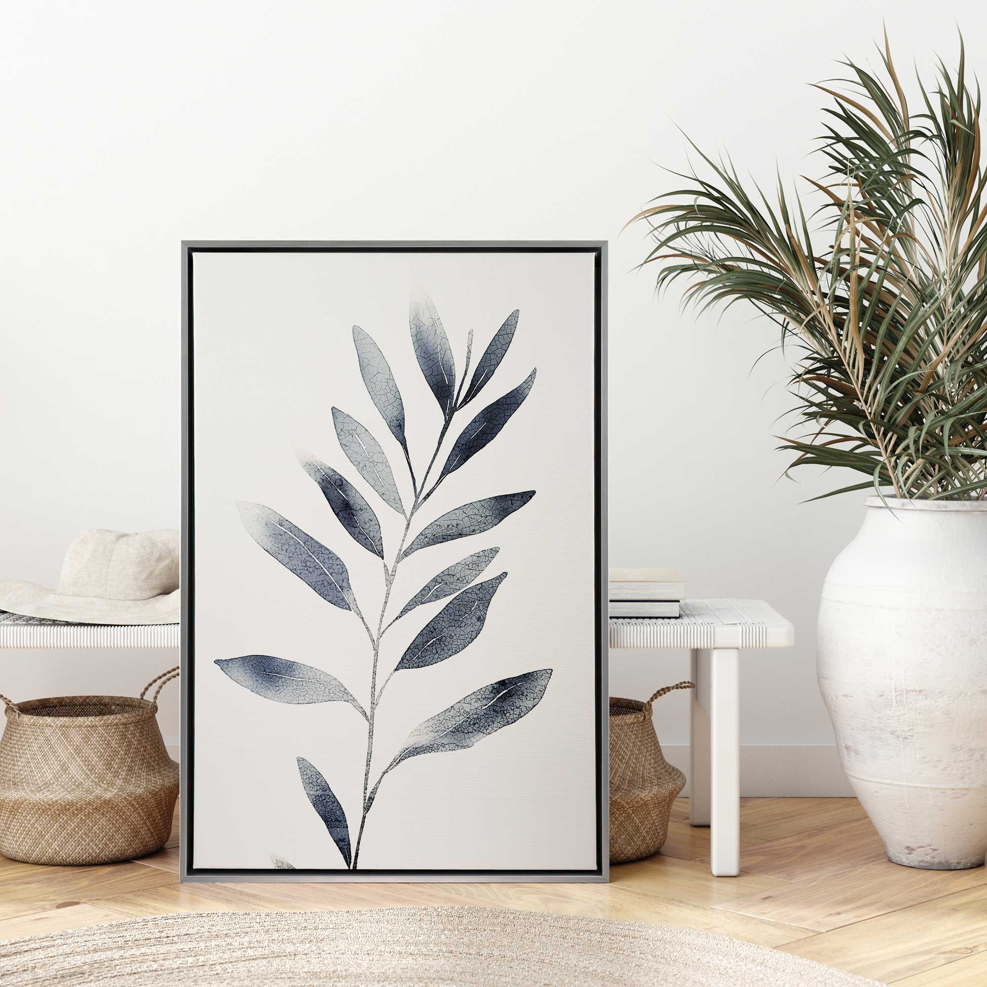 monochrome botanica canvas print in a silver floater frame