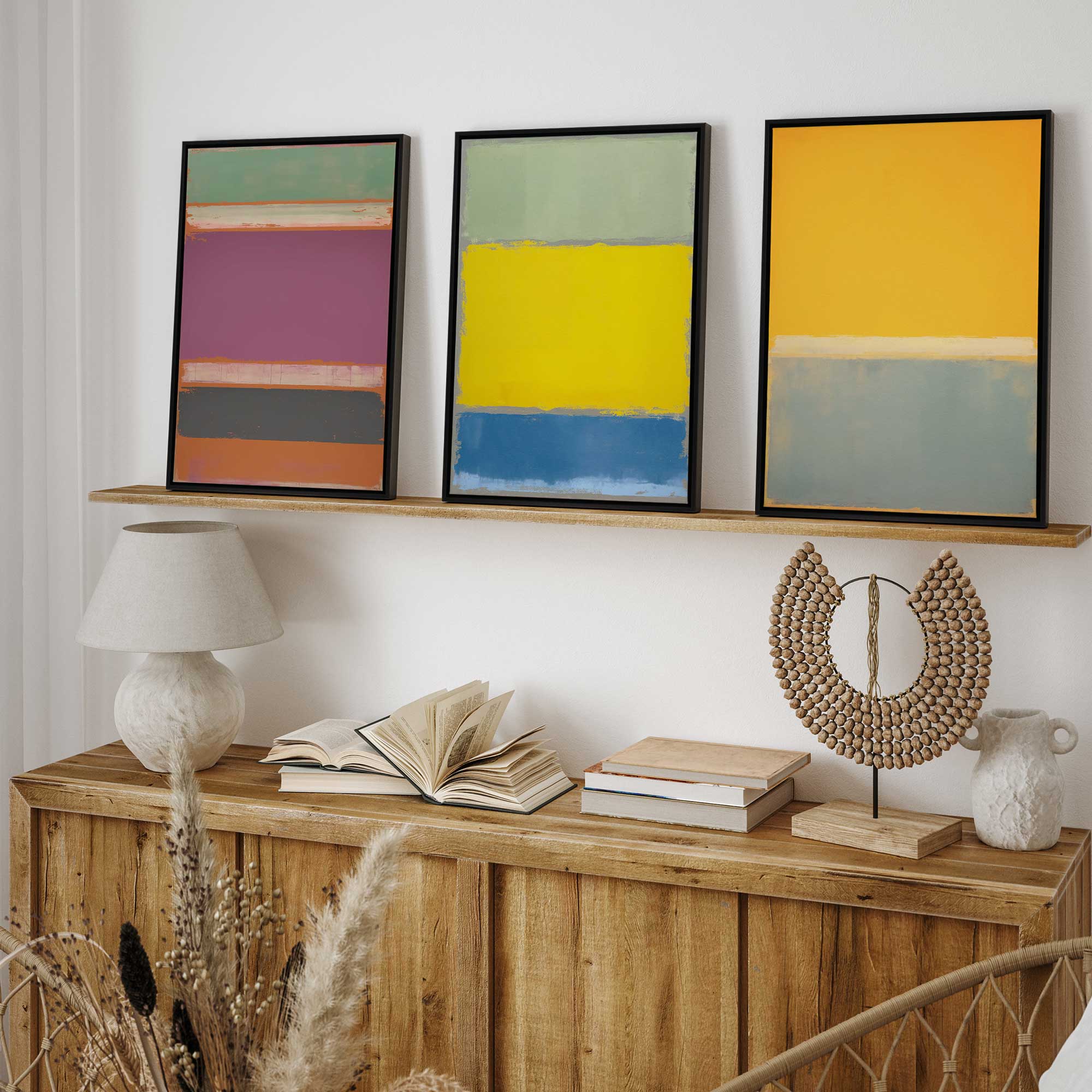 Sunfield glow triptych set of 3 canvas color block prints on a shelf in an entryway