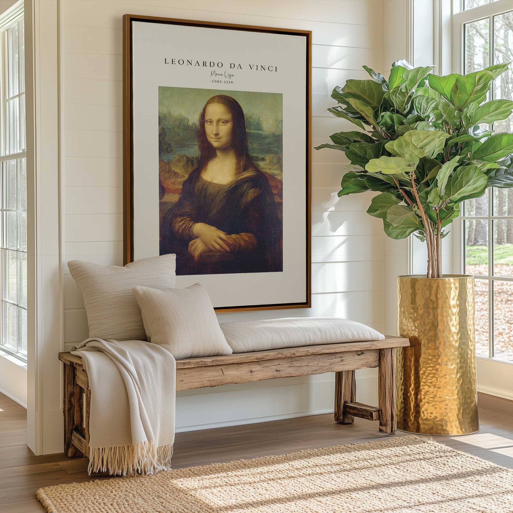 Mona List art print on canvas in a gold floater frame hanging above bench