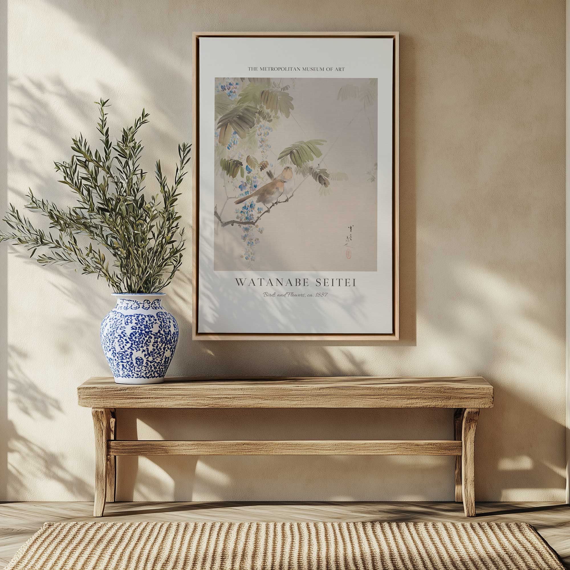 birds and flowers by watanabe seitei canvas print in a maple frame hanging above a bench