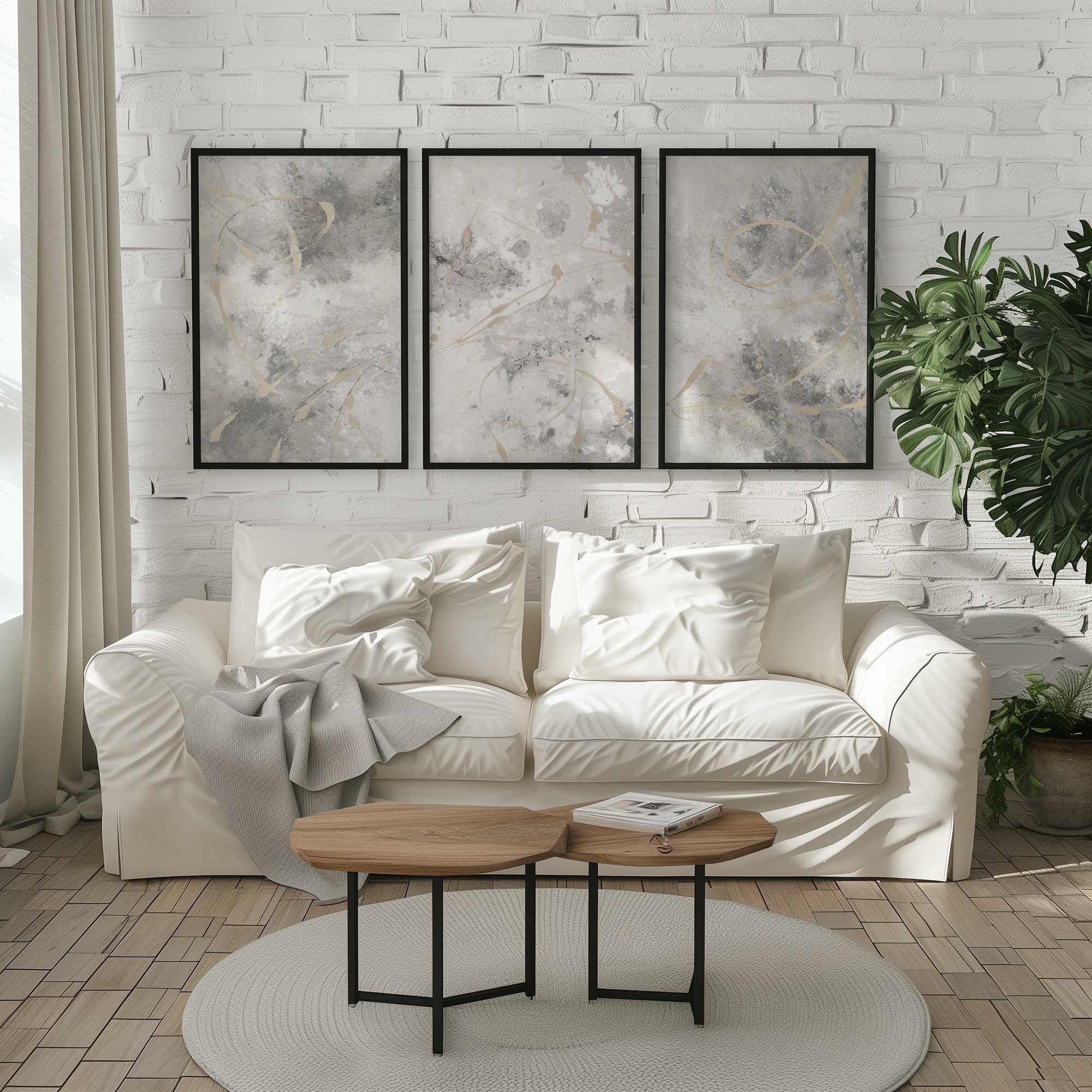 Gilded Whispers set of 3 framed prints over exposed brick wall