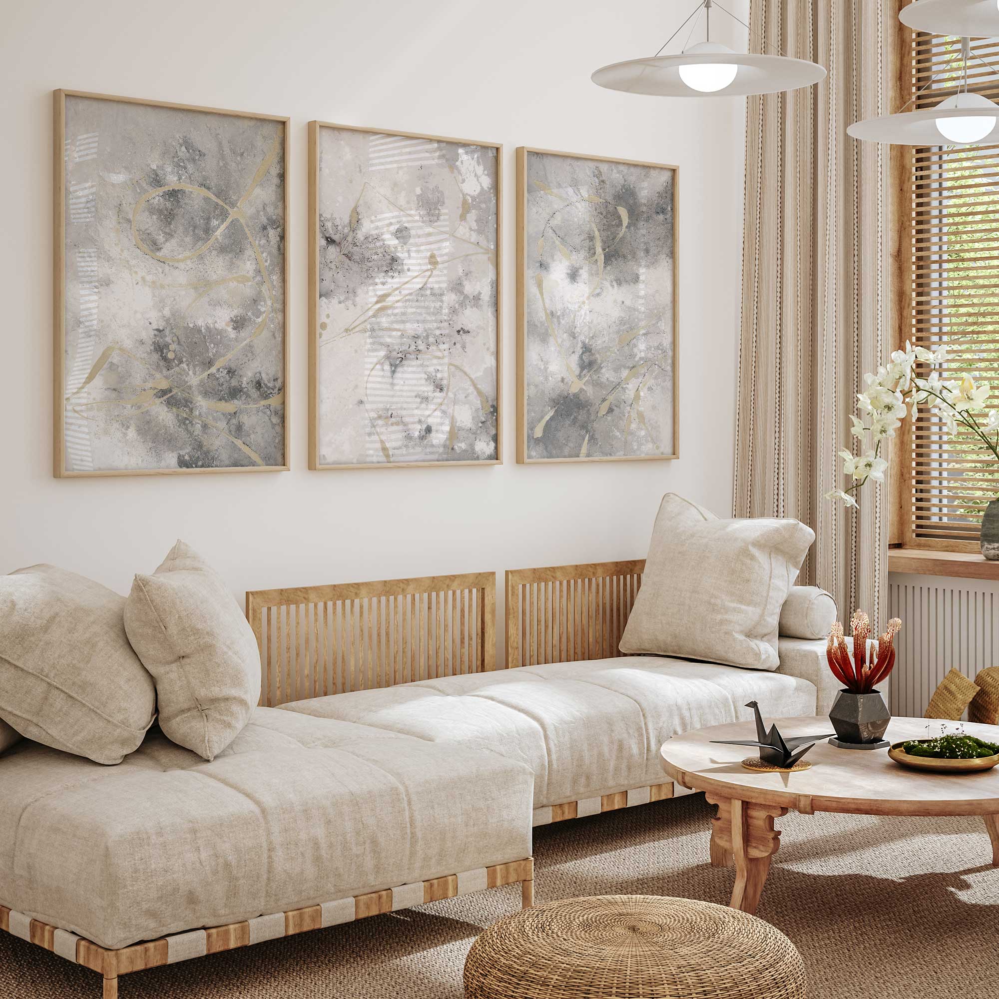 Gilded Whispers, set of 3 maple framed prints hanging above a white couch