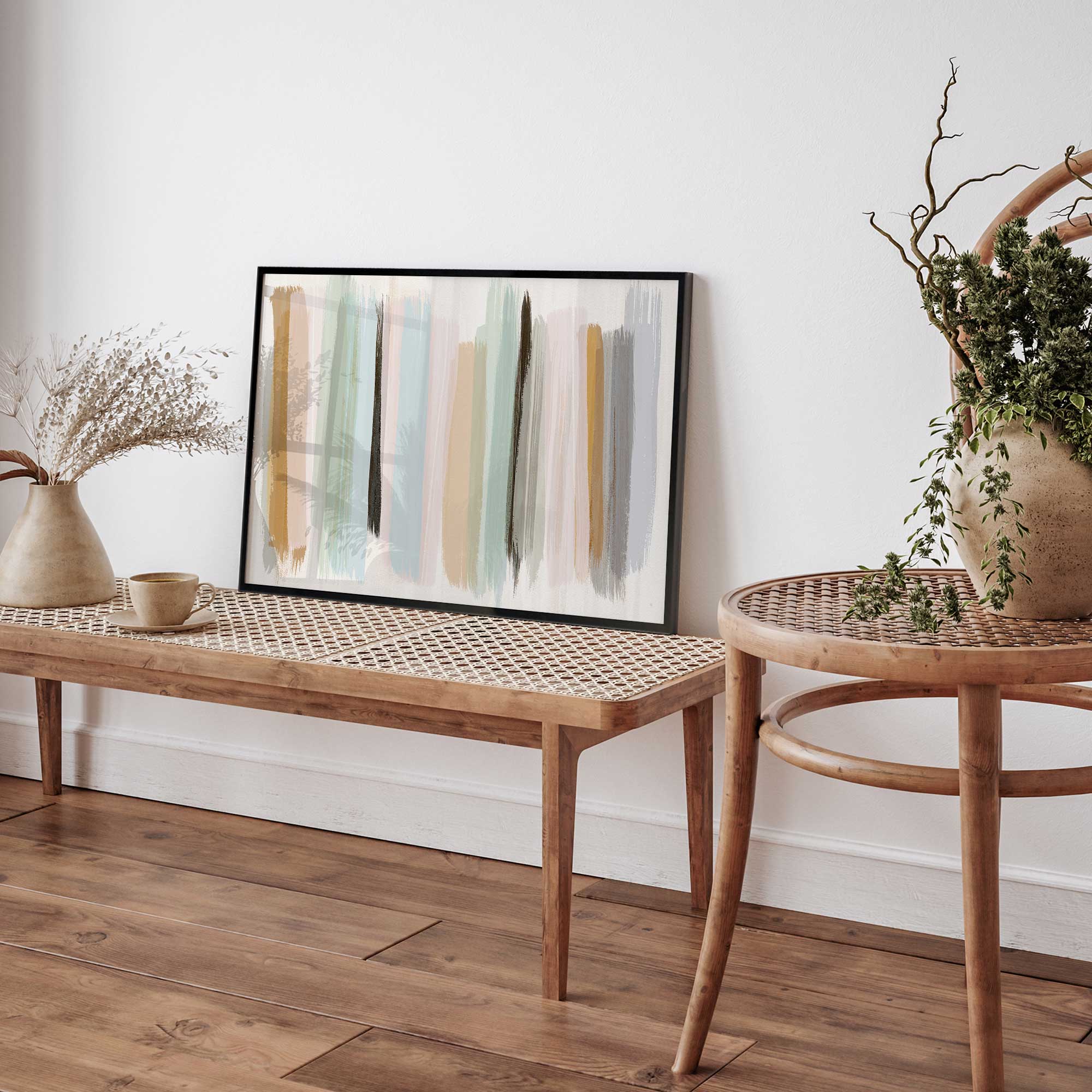 pastel panache print in a black frame on a table