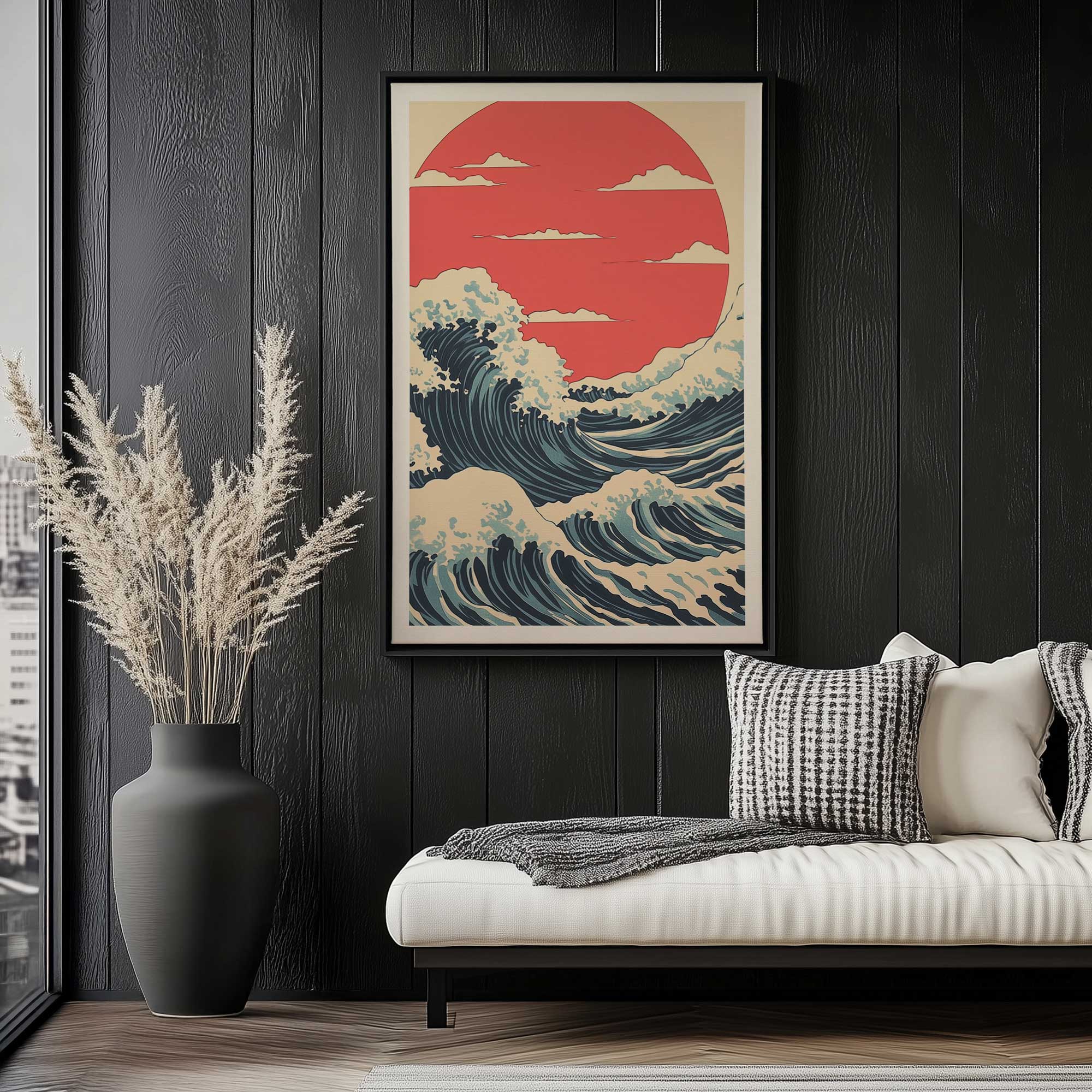 hokusai style sundown swell art print in a black frame hanging above a modern white and black couch