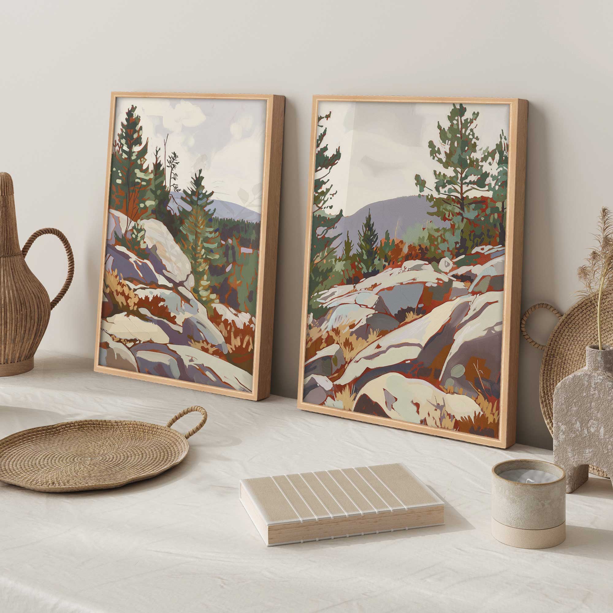 Rocky Mountain View set of 2 prints in maple frames on a countertop