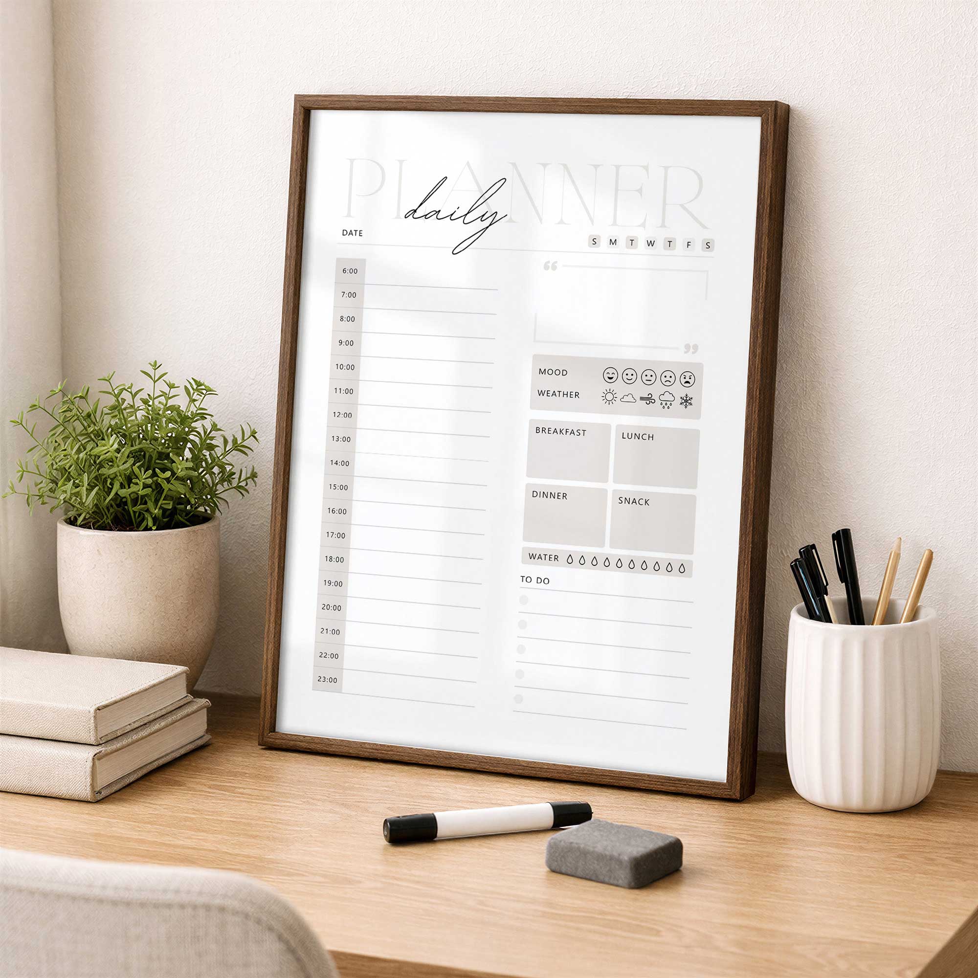 dry earse daily planner leaning on a desk