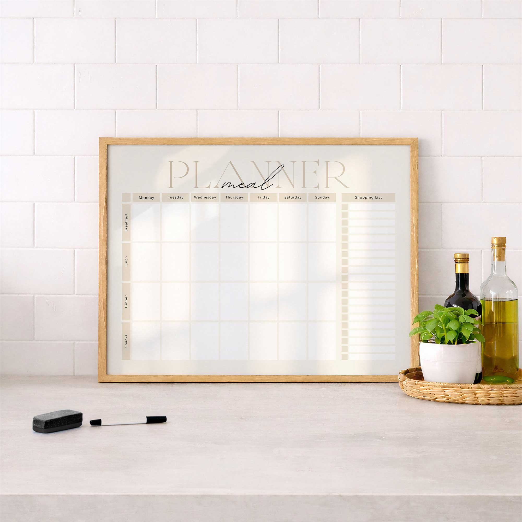 Dry erase weekly meal planner on a kitchen counter