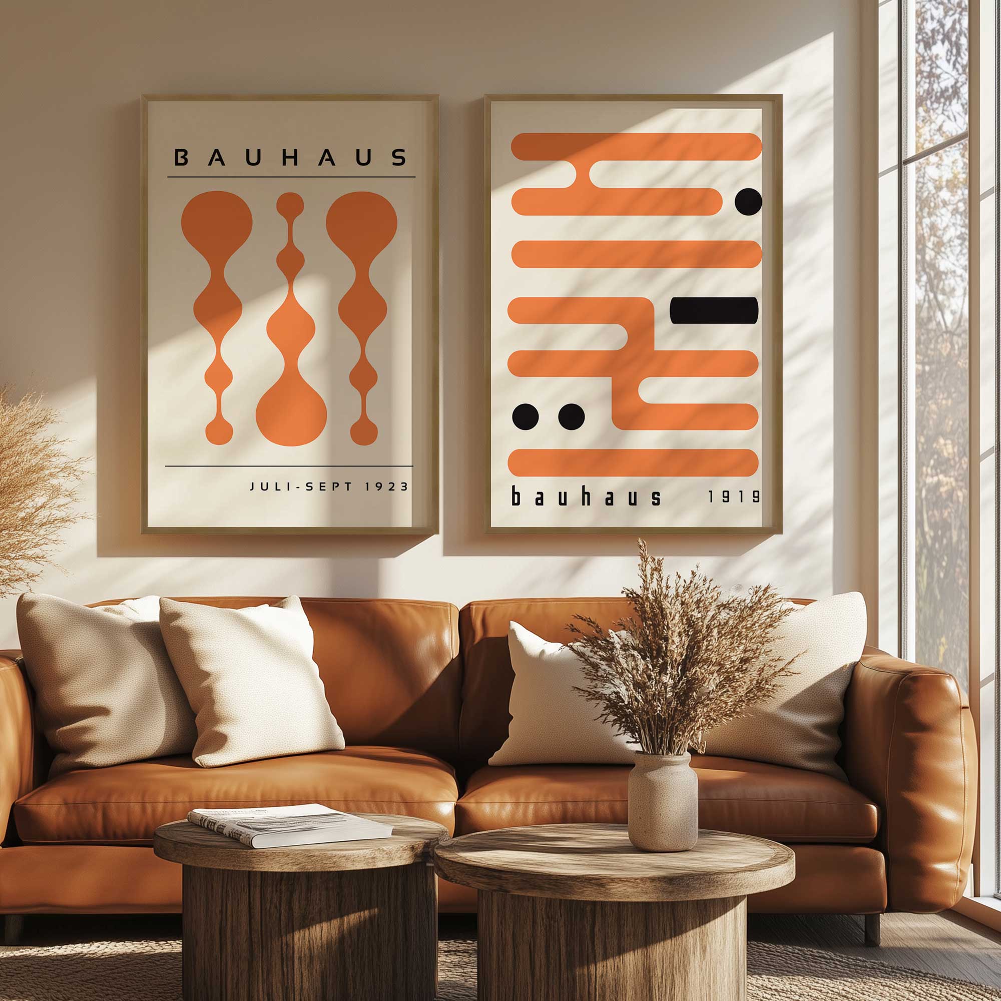 Retro and circuitry orange bauhaus set of 2 prints hanging above an orange leather couch