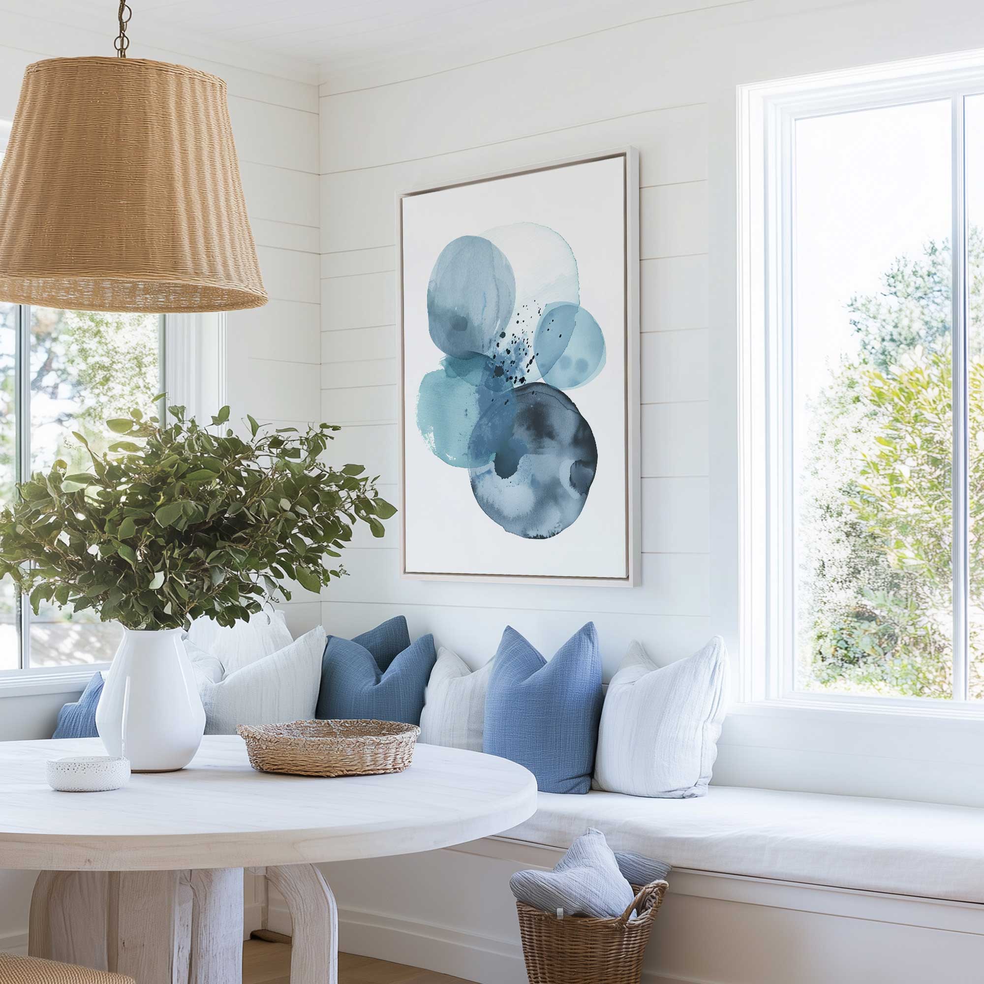 lapis layers print on framed canvas hanging in light airy dining room