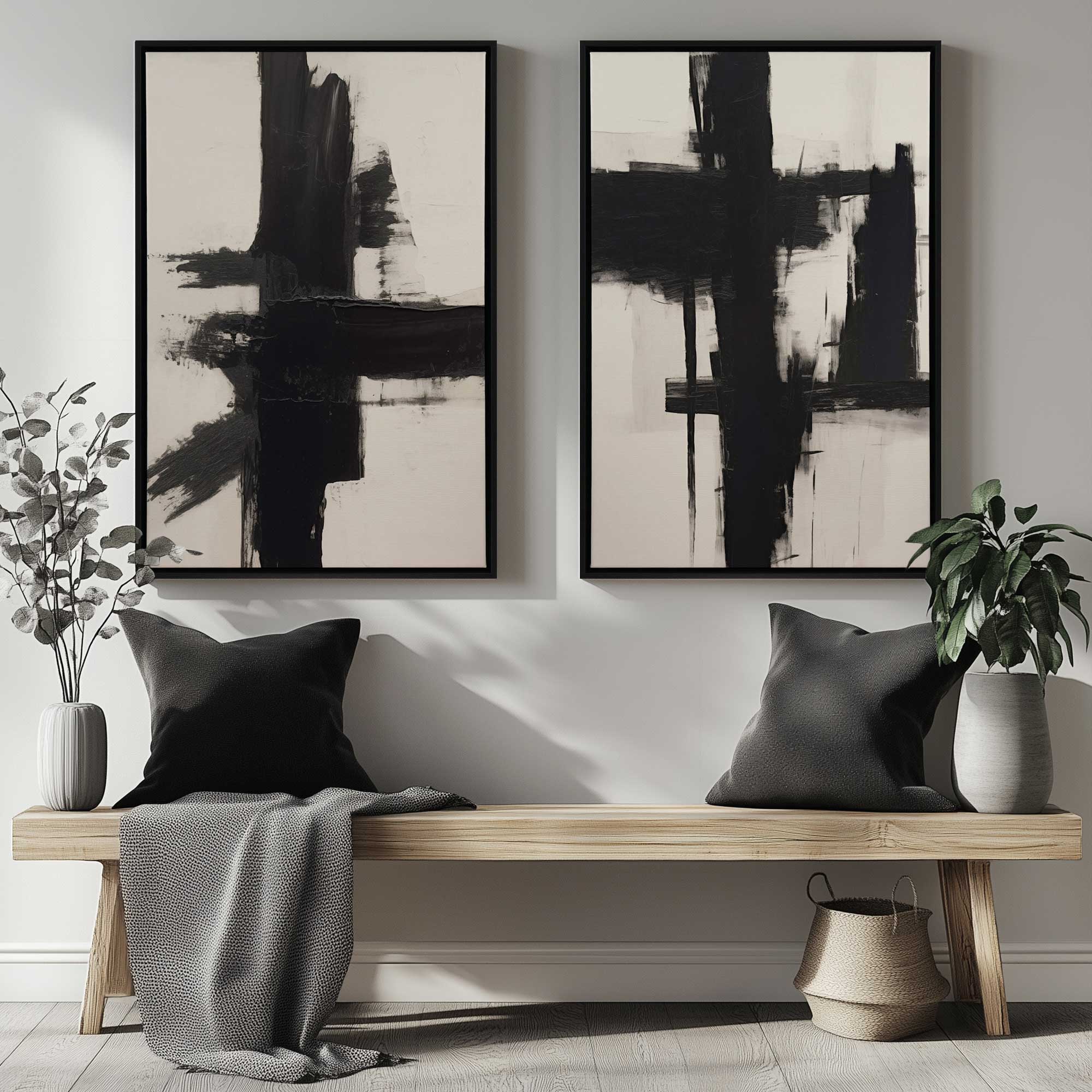 Contrast in Silence set of 2 canvas prints in black frames hanging over a bench