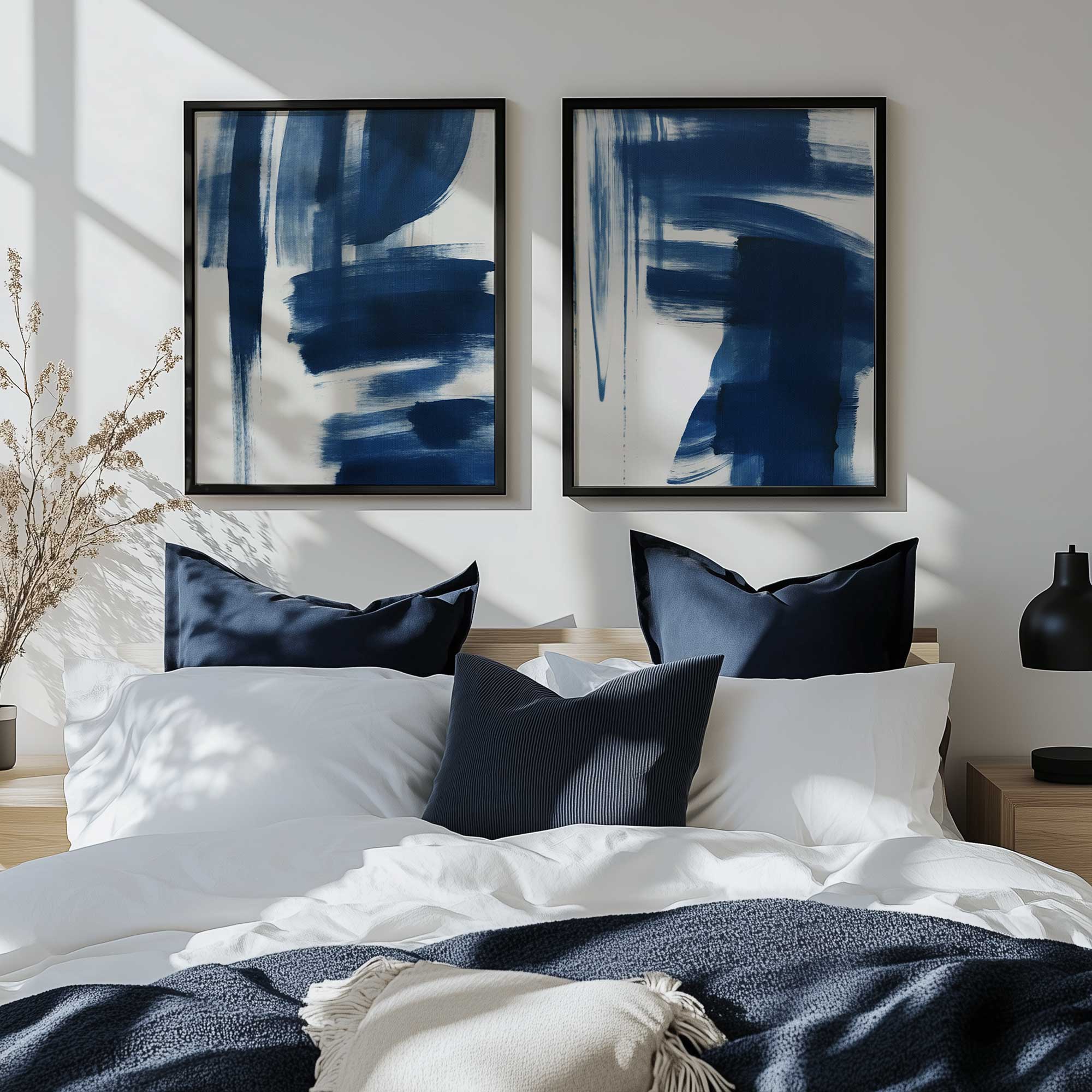 Azure Brush Waltz set of 2 abstract blue prints hanging above the bed