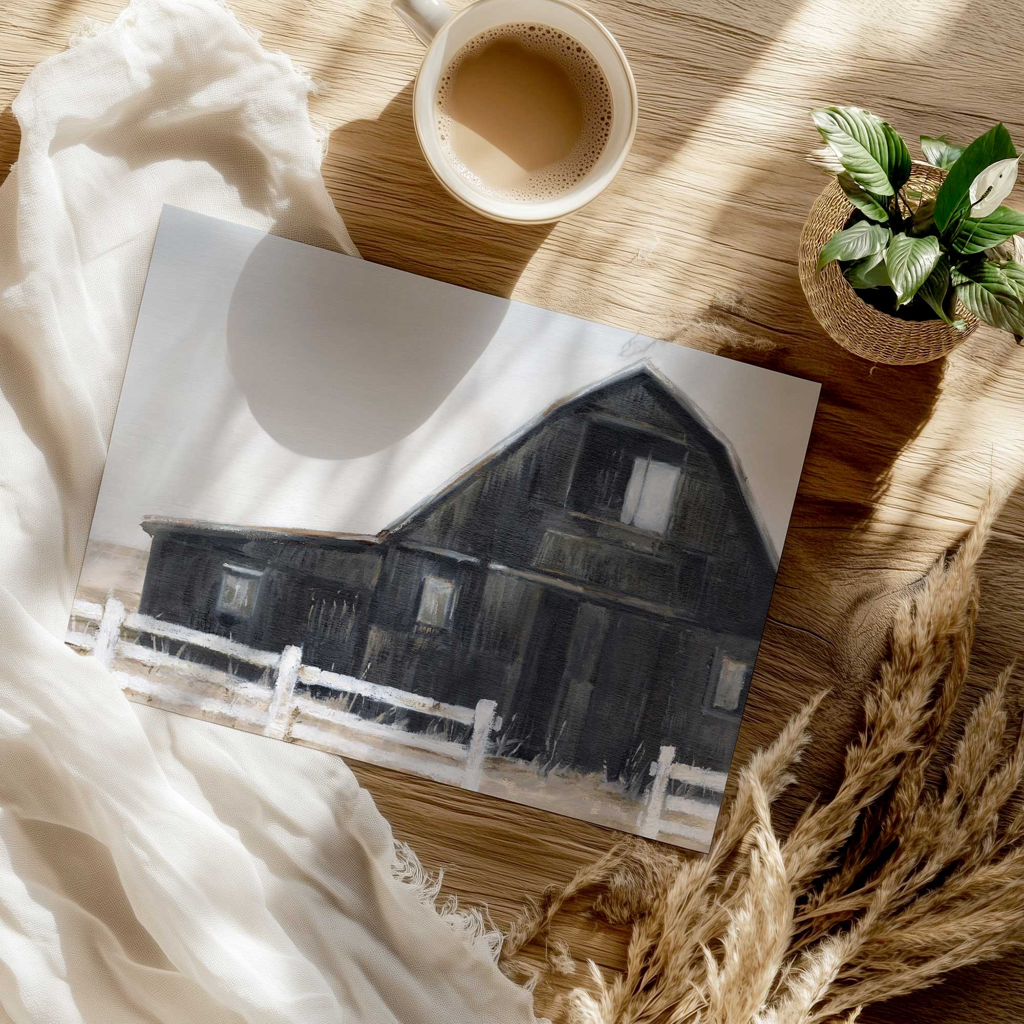 weathered black barn II rolled print on a counter top