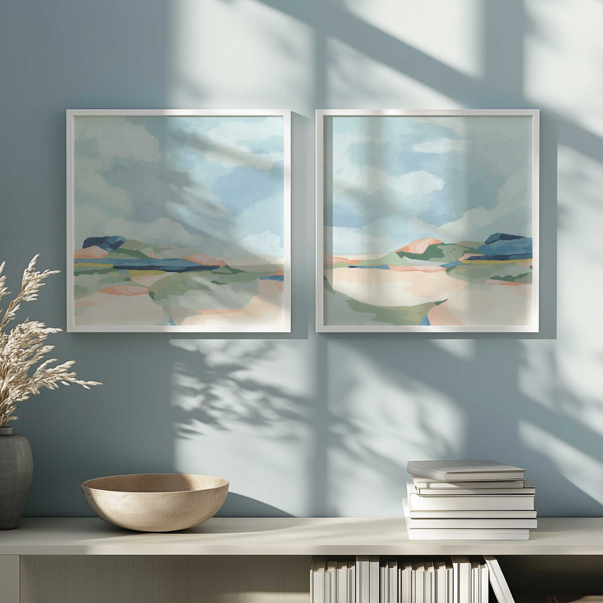 serene seaside pastels set of 2 framed abstract prints hanging above book shelf