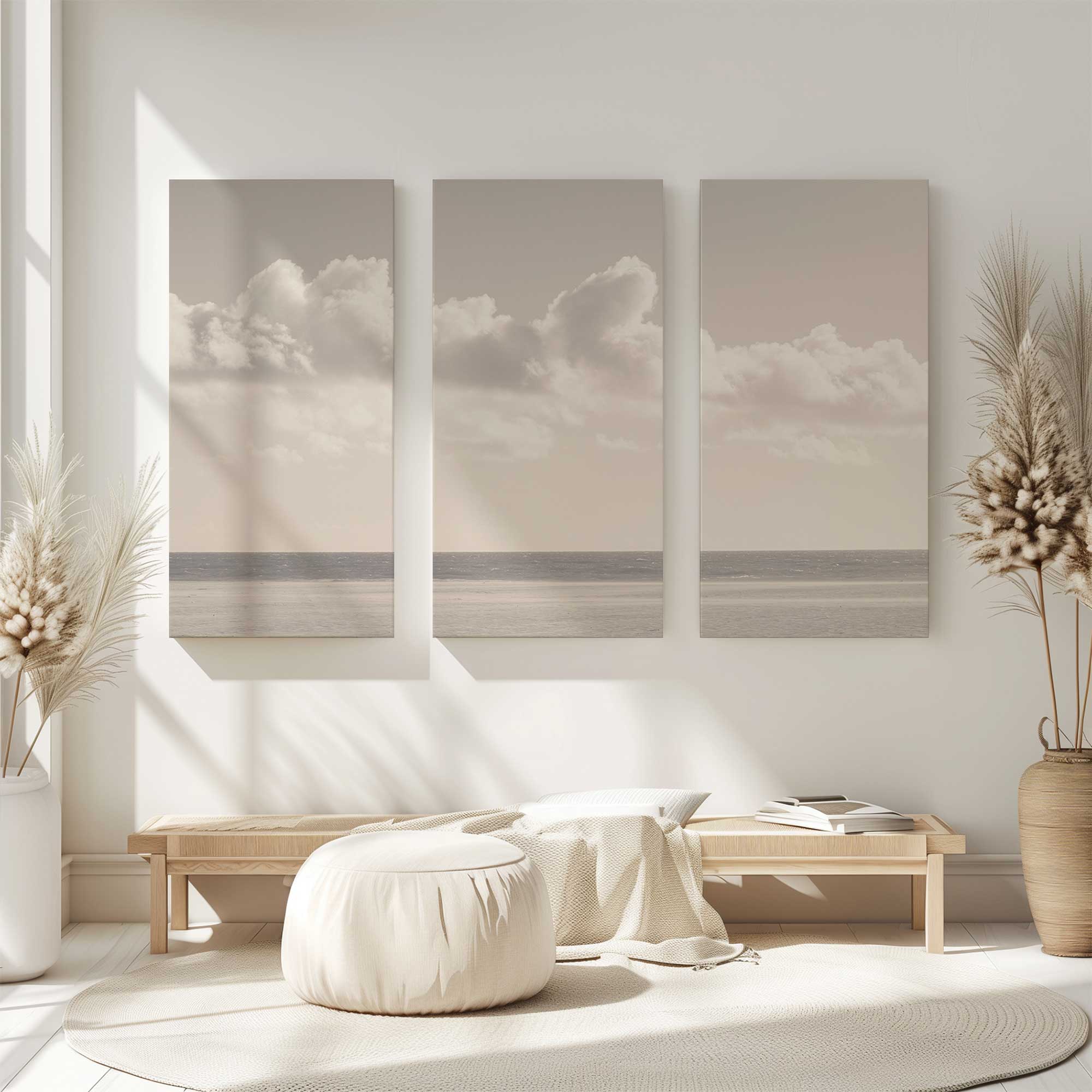 calm ocean skies large 3 piece canvas print in a clean white living room