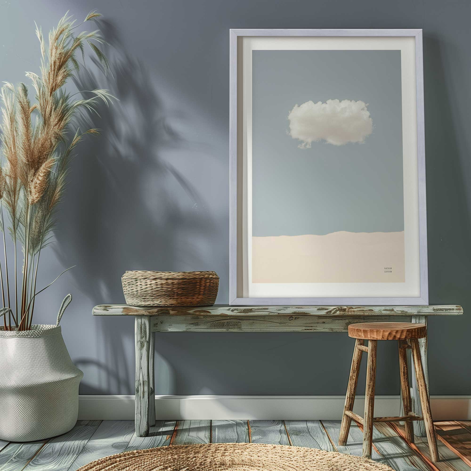 large solitary cloud print in an entrywall