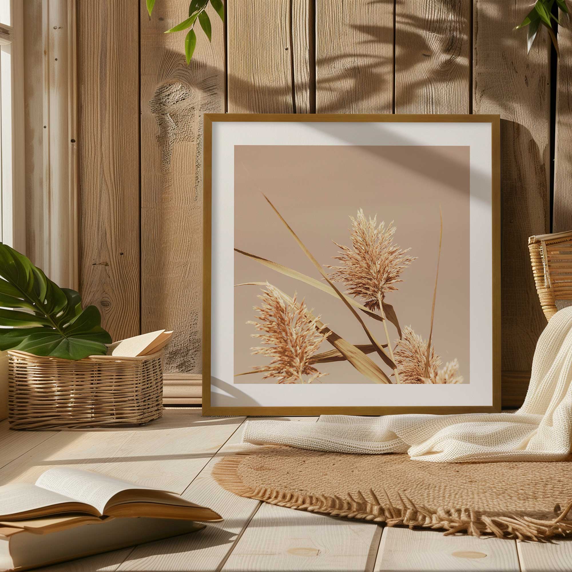 fields of gold print in a gold frame in a room