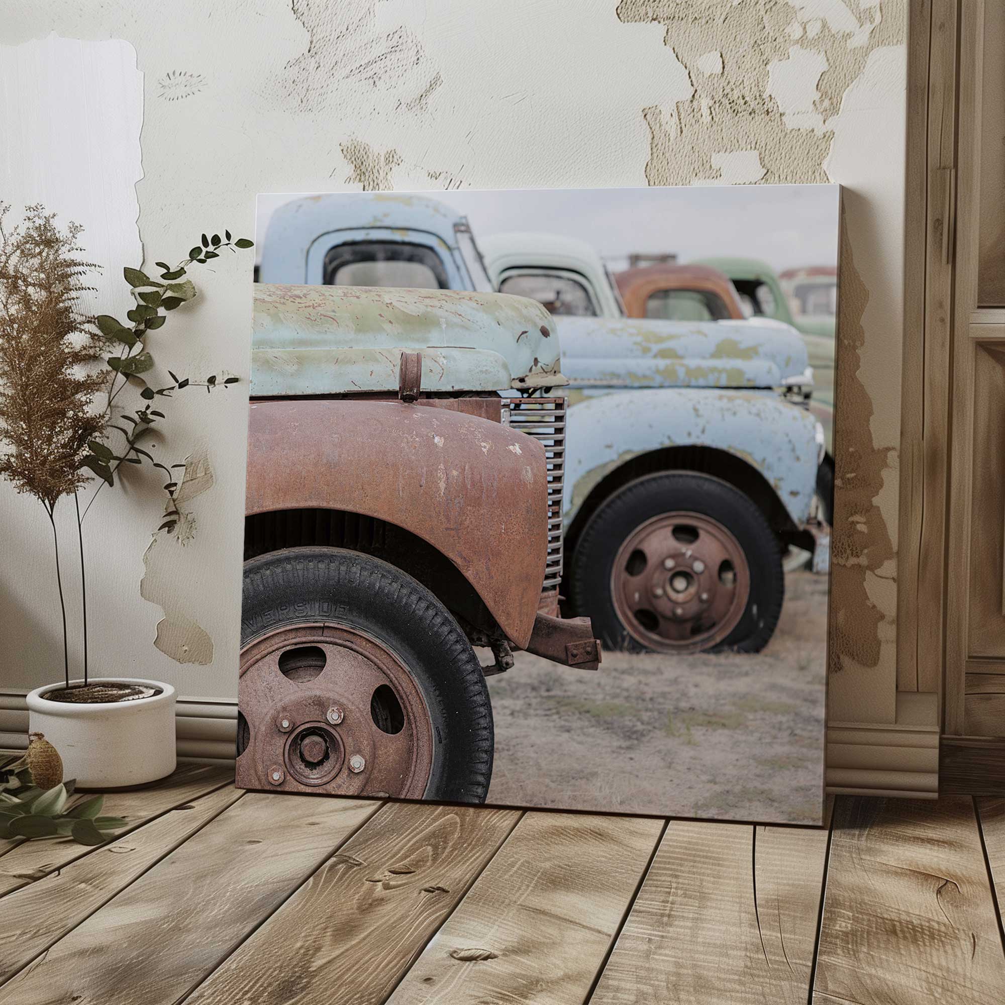 weathered wheels print on canvas leaning against wall