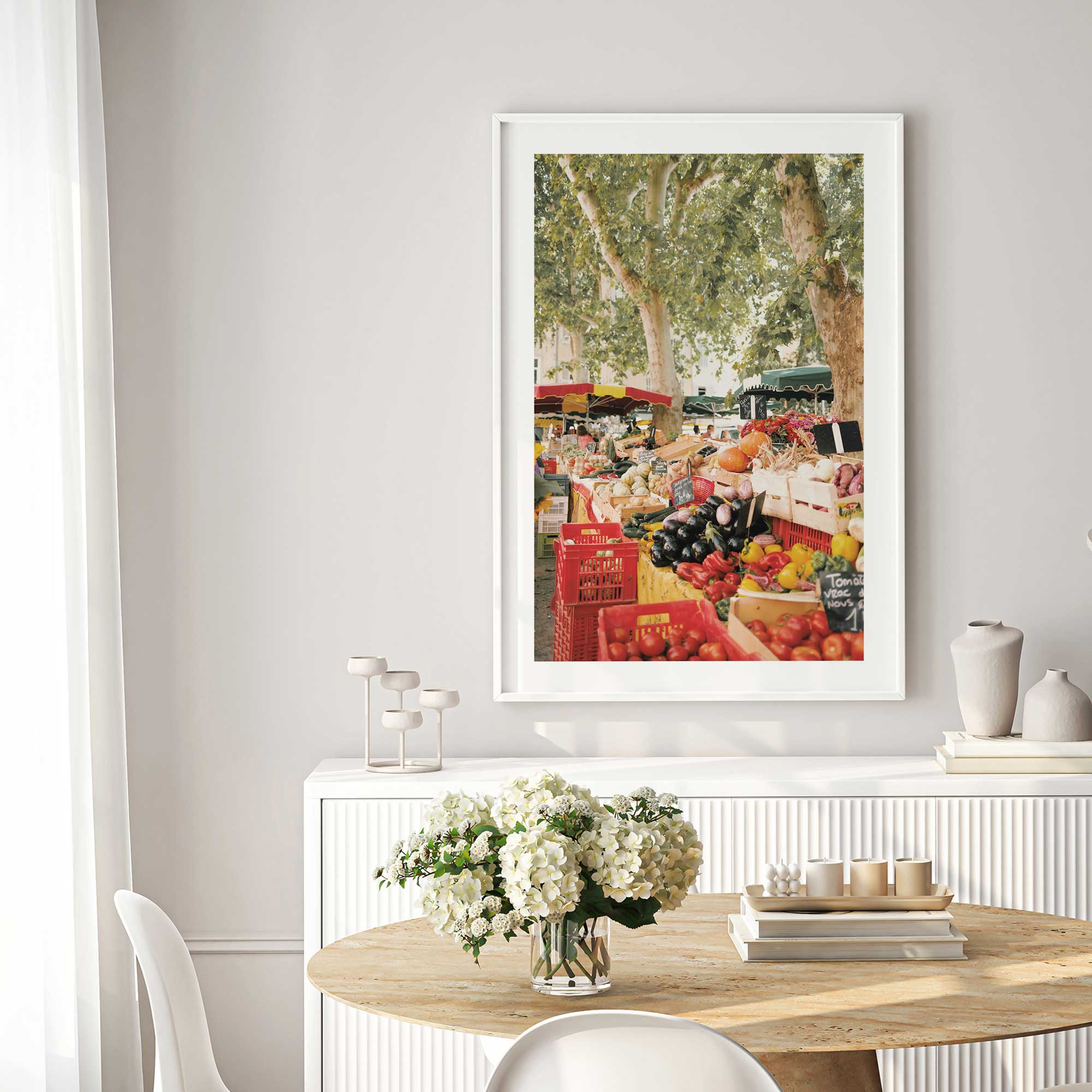 market treasures photo on kitchen wall in a white frame