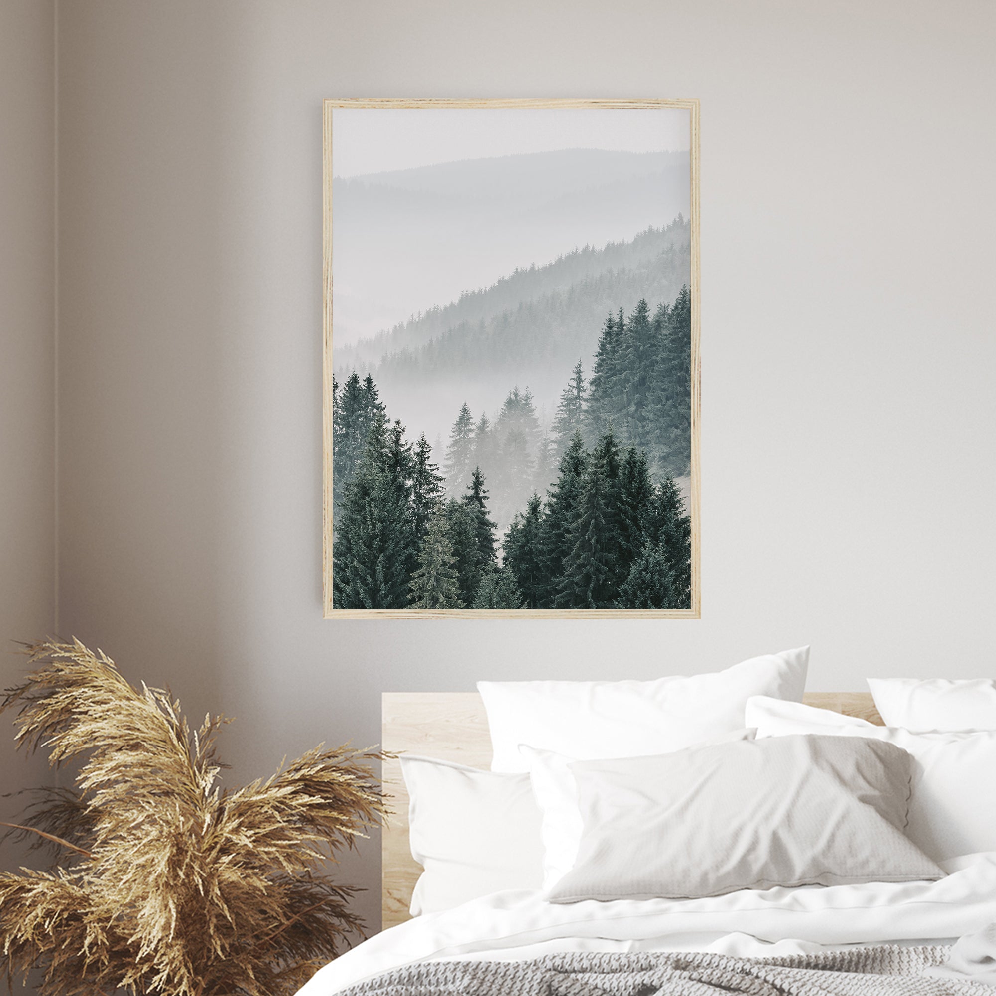 enchanted peaks forest photo in light wood frame on bedroom wall